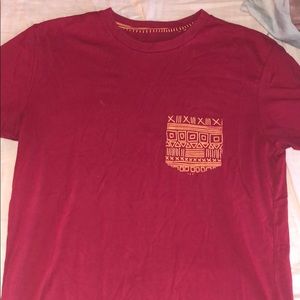 Red tribal pockets shirt